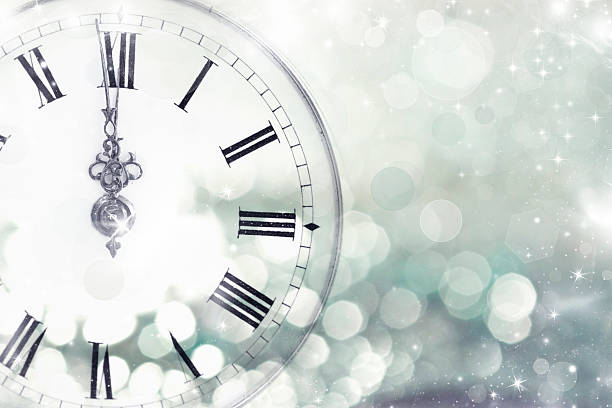 Old clock with stars and snowflakes stock photo