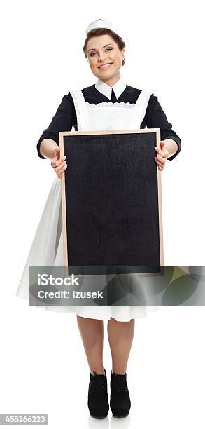 Victorian Style Maid With Blackboard Stock Photo - Download Image Now - 1920-1929, 20-29 Years, Adult