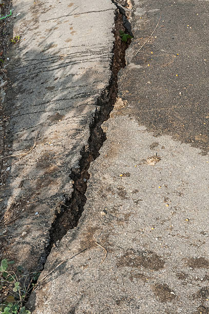 istock Abandoned and crack road in Thailand. 455273059