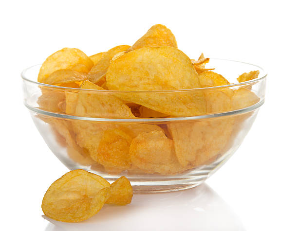 istock Delicious potato chips in bowl 455289283
