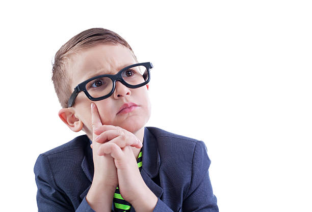 istock Cute little boy in glasses looking sideways 455291977