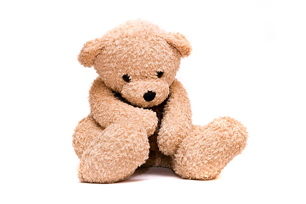 Brown teddy bear looking sad and alone Teddy-bear isolated on a white background stuffed toy stock pictures, royalty-free photos & images
