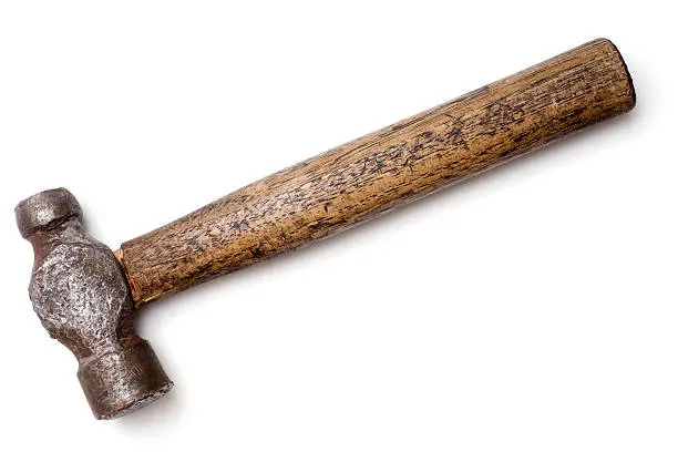 Antique ball peen hammer on white background