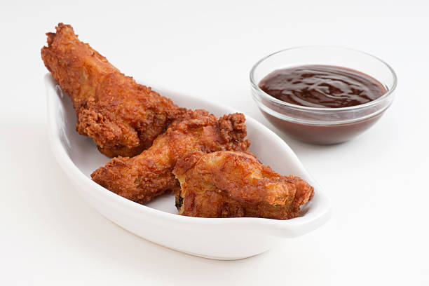 istock Spicy Chicken Wings with Hot Sauce 455578773