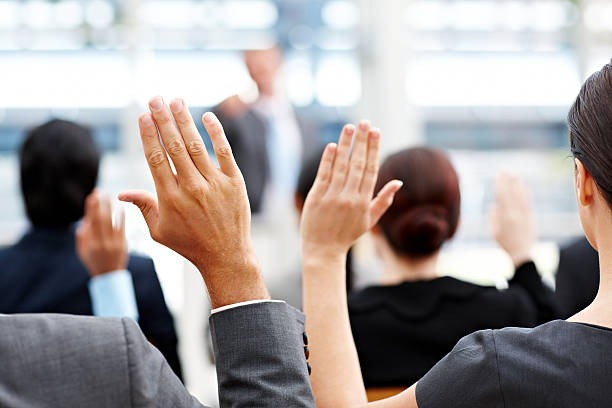 istock Business People Raising Their Hands 455586301