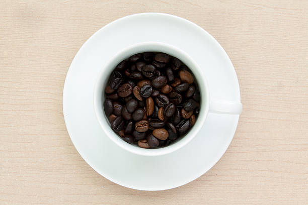 Coffee bean in  cup stock photo