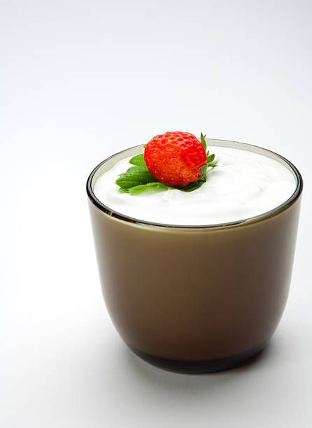 istock Strawberry in sour cream on the cup 455607021
