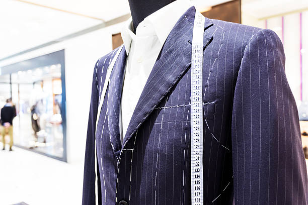 istock Suits on shop mannequins 455613935