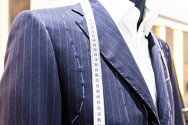 istock Suits on shop mannequins 455613939