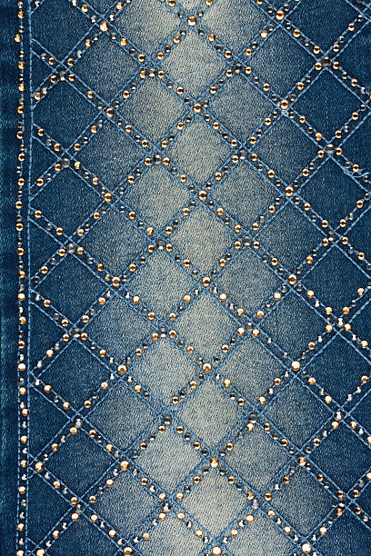 istock Light-blue denim with yellow and silver rhinestones 455618903