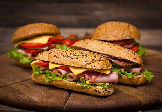 istock Sandwiches on the wooden table 455620205