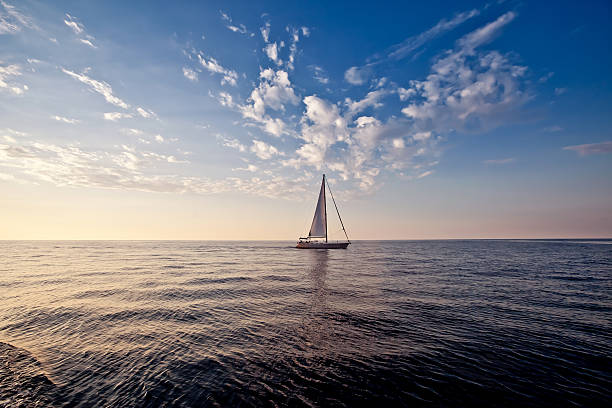 istock Lonely yacht at sunset 455620291