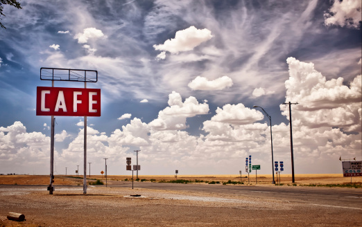 Cafe sign along historic Route 66 in Texas. Vintage Processing.