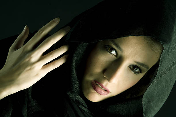 istock Mysterious woman in scarf 455622723