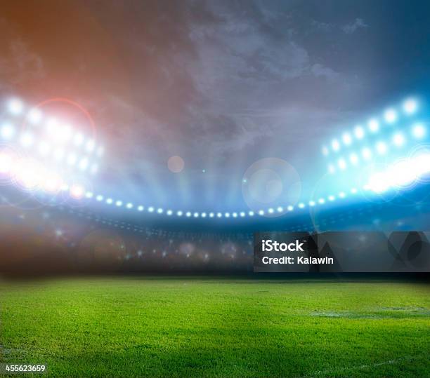 Bright Stadium Lights Illuminating Field At Night Stock Photo - Download Image Now - Stadium, Rugby - Sport, Soccer