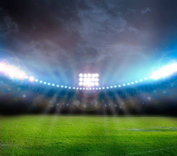 bild von stadion mit lichtern und blinkt - soccer field night stadium soccer stock-fotos und bilder