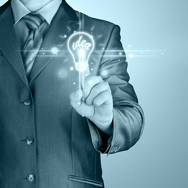 istock Business man touching light of idea 455624715