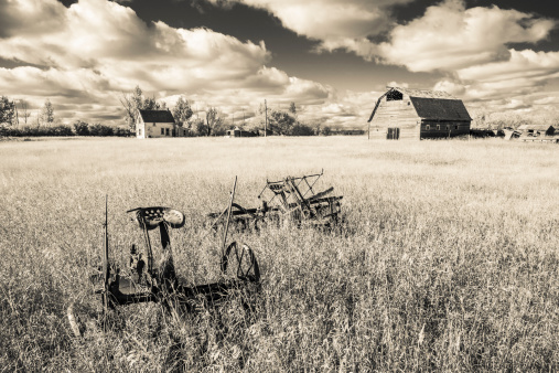An old farm yard on the Canadian Prairies. Taken with an infared monochrome sepia filter.