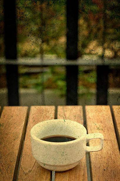 black coffee in garden,grunge style stock photo