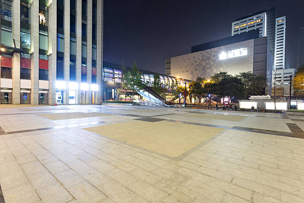 istock night scene of modern city square 455627941