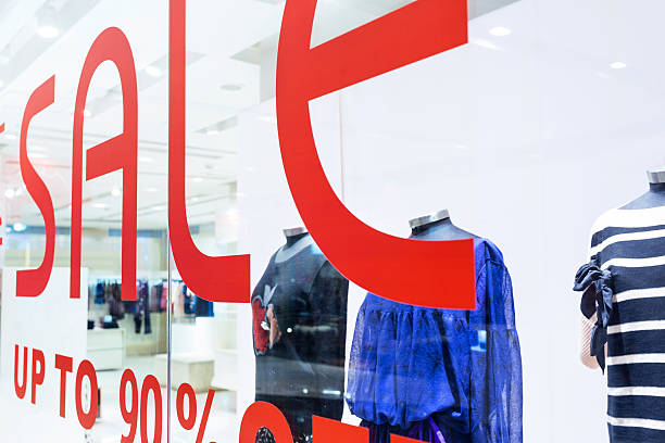 istock sale word with shop window 455628095