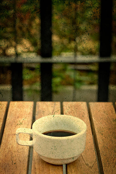 black coffee in garden,grunge style stock photo