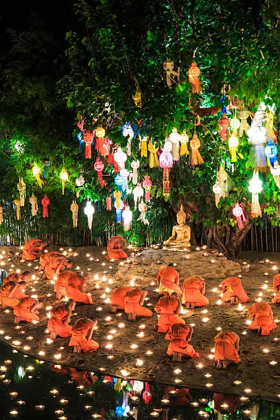 Loy Krathong festival in Chiangmai.Tradition al monk Lights floating balloon made of paper annually at Wat Phan Tao temple Chiangmai,Thailand