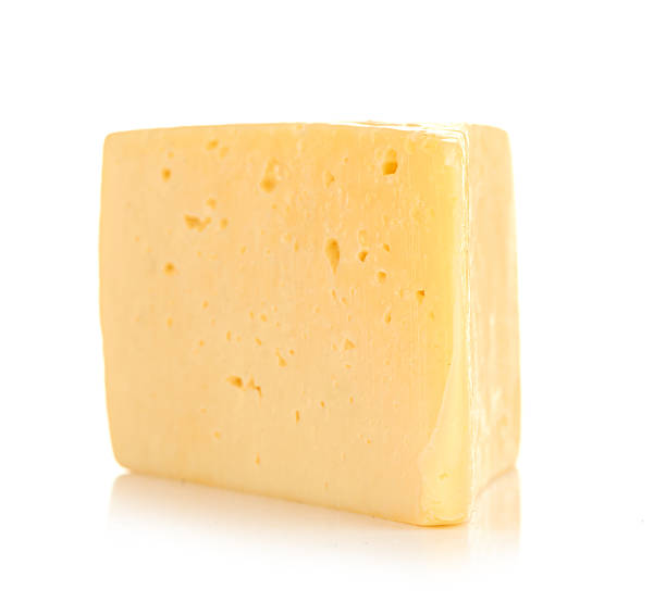 istock piece of cheese isolated on white 455635611