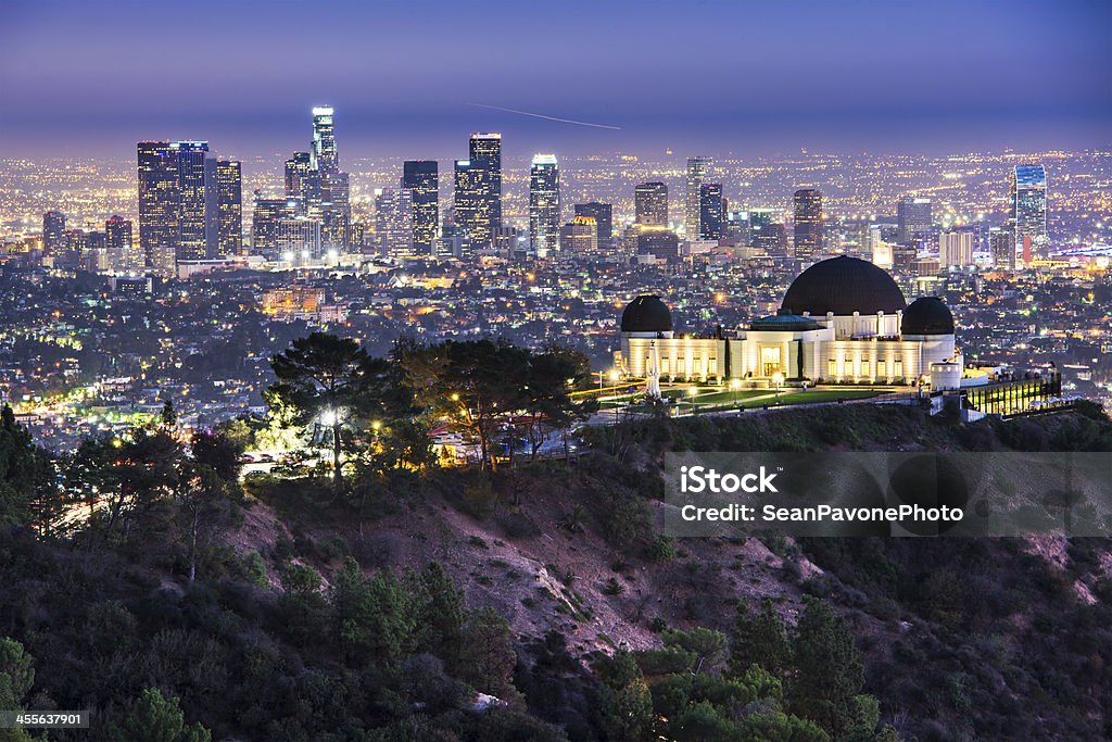 Los Angeles Griffith Obervatory and Downtown Los Angeles, California, USA skyline at dawn. City Of Los Angeles Stock Photo