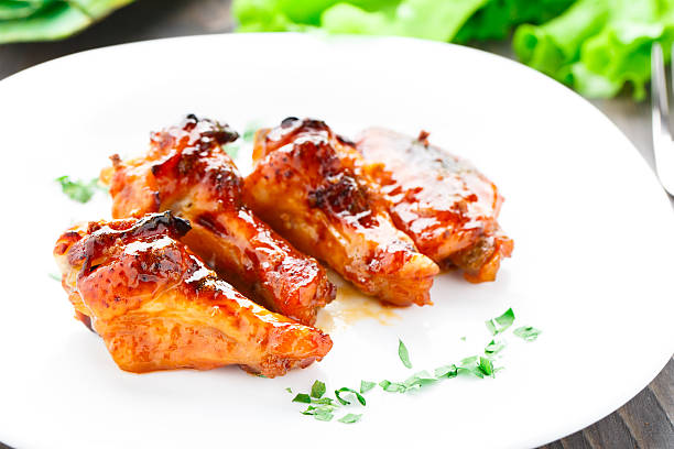istock Chicken wings with honey sauce 455641113