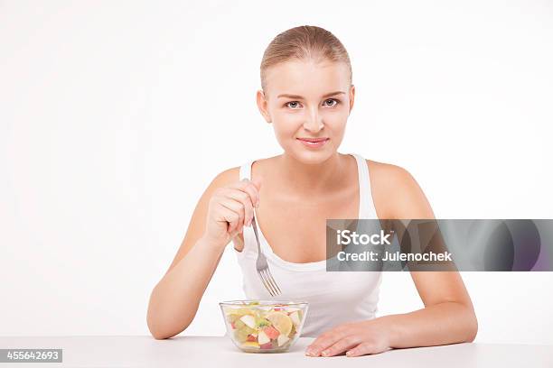 Pretty Girl Eating Fruit Salad Isolated Stock Photo - Download Image Now - Adult, Beautiful People, Beautiful Woman