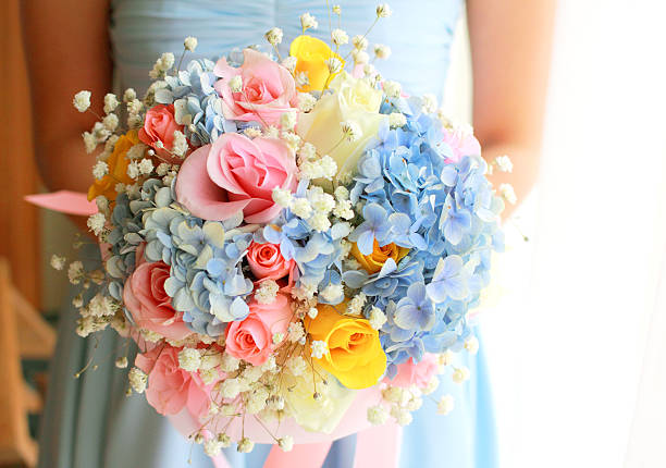 istock Bride or bridemaid with bouquet, closeup 455643713