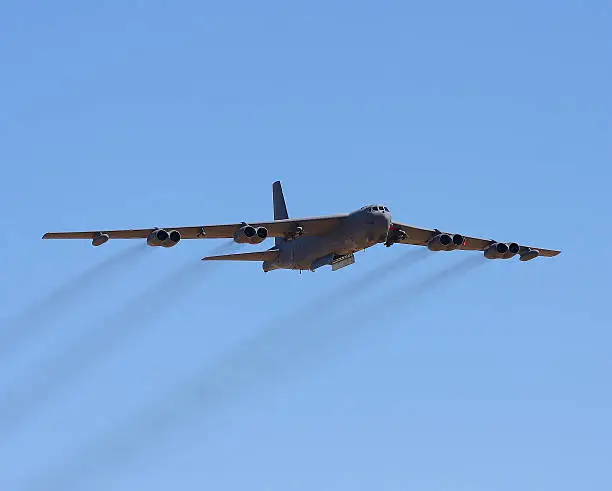Boeing B-52 Stratofortress flying at the Edwards AFB open house with bomb bay doors open