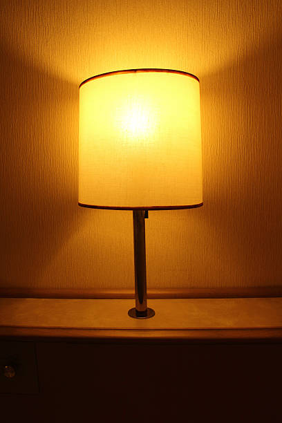 istock lamp in the bed room 455652565