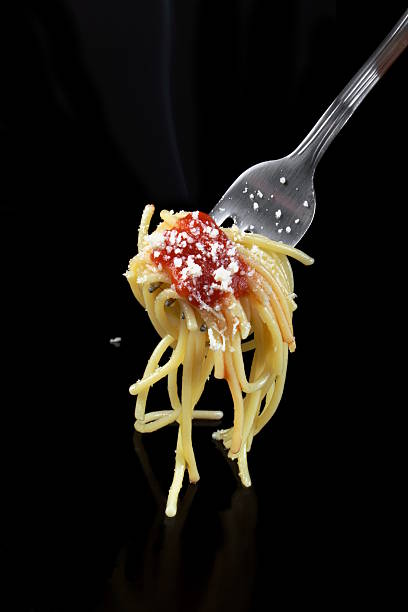 istock Spaghetti with tomato sauce and parmisan cheese. 455655837