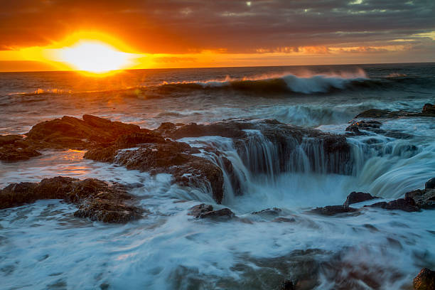 istock Thor's Well Crashing Waves at sunset 455657123