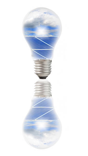 istock Lamp bulb with solar panels and sky inside 455658339