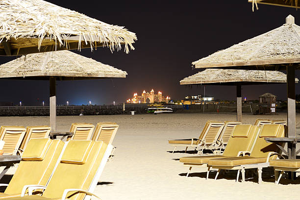 istock Beach night illumination with a view on Palm Jumeirah 455659041