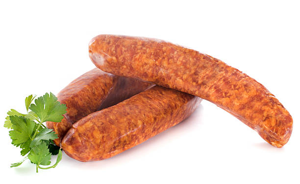 Montbeliard sausagesz Montbeliard sausages in front of white background doubs photos stock pictures, royalty-free photos & images