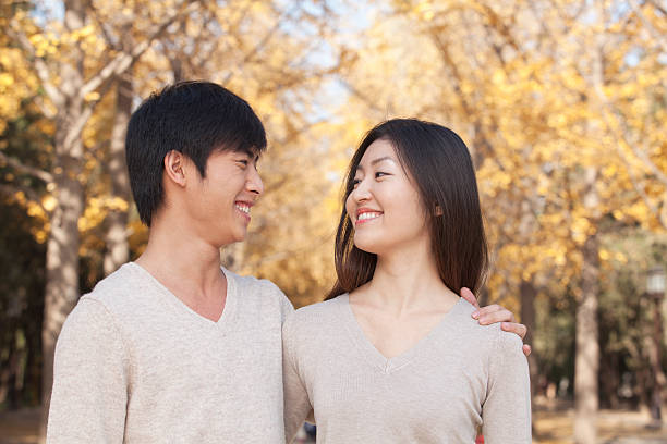 istock Young Couple in the Park 455669835