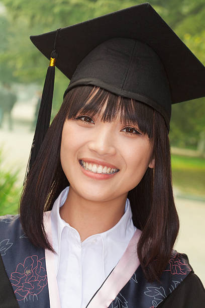 istock Young Woman Graduating From University, Close-Up Portrait 455670831
