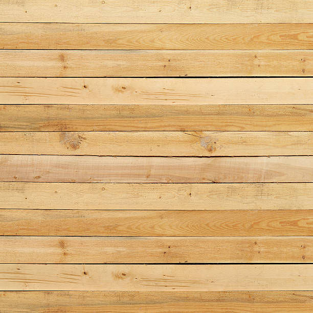 istock Wood pine plank yellow texture for background 455682745