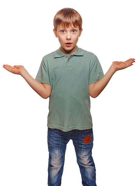 istock blond raised his hands up baby boy surprised isolat 455685283