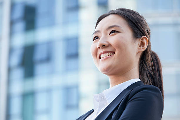 istock Low Angle of a Young Businesswoman Smiling 455687883