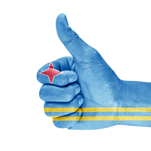 Flag of Aruba on thumb up hand with a white background.