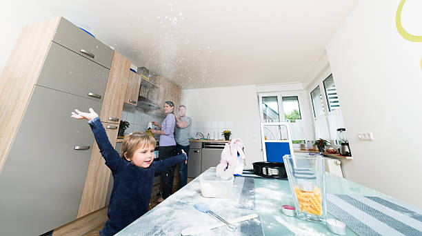 istock Young family having fun baking. Mother+ Father and daughter 455778567