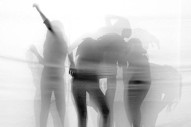 istock Group of contemporary dancers performing on stage 455787039
