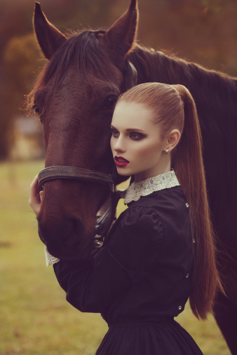 Young girl and her beautiful horse