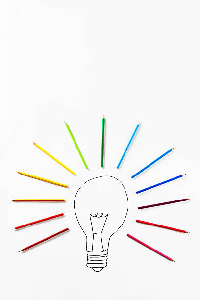 istock Inspiration strikes! Sketched lightbulb with crayons indicating emphasis radiating around 455848375
