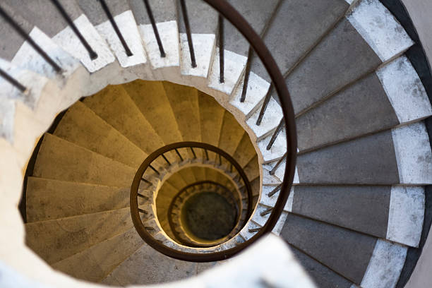 istock Spiral Marble Staircase With Railing in an Apartment Building 455848483